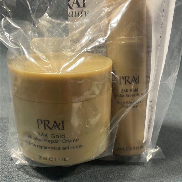 PRAI Beauty 24K Gold Wrinkle Repair Creme & Serum 2 PC SET - NEW UNOPENED - Picture 1 of 6